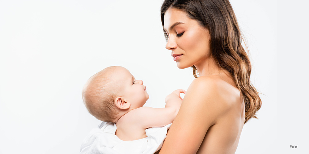 Female with a child in her arm